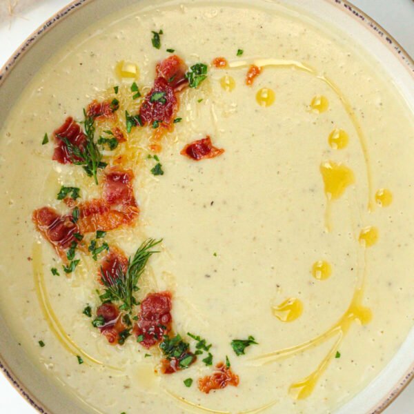 easy roasted garlic soup with bacon bits and cheddar
