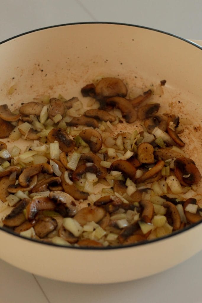 mushrooms and onion on a pan