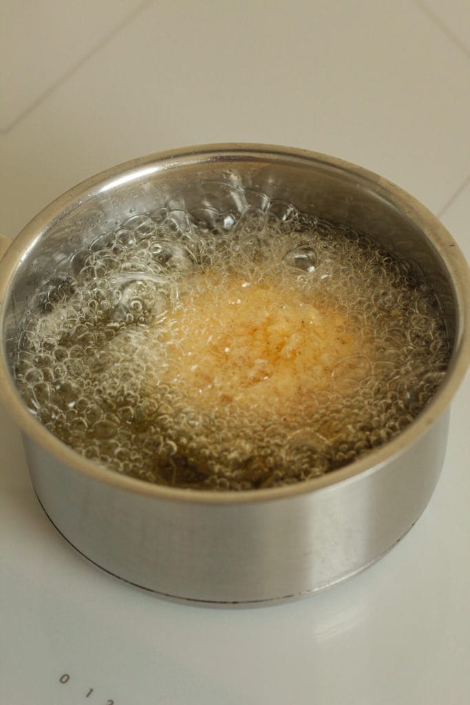 frying burrata in a pot