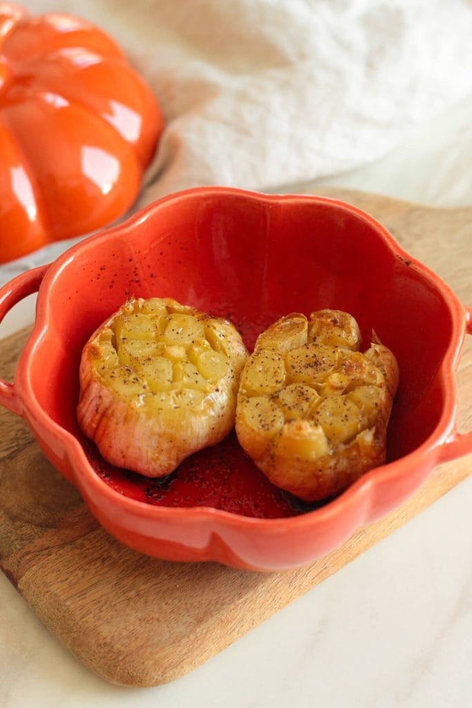 two roasted garlic heads