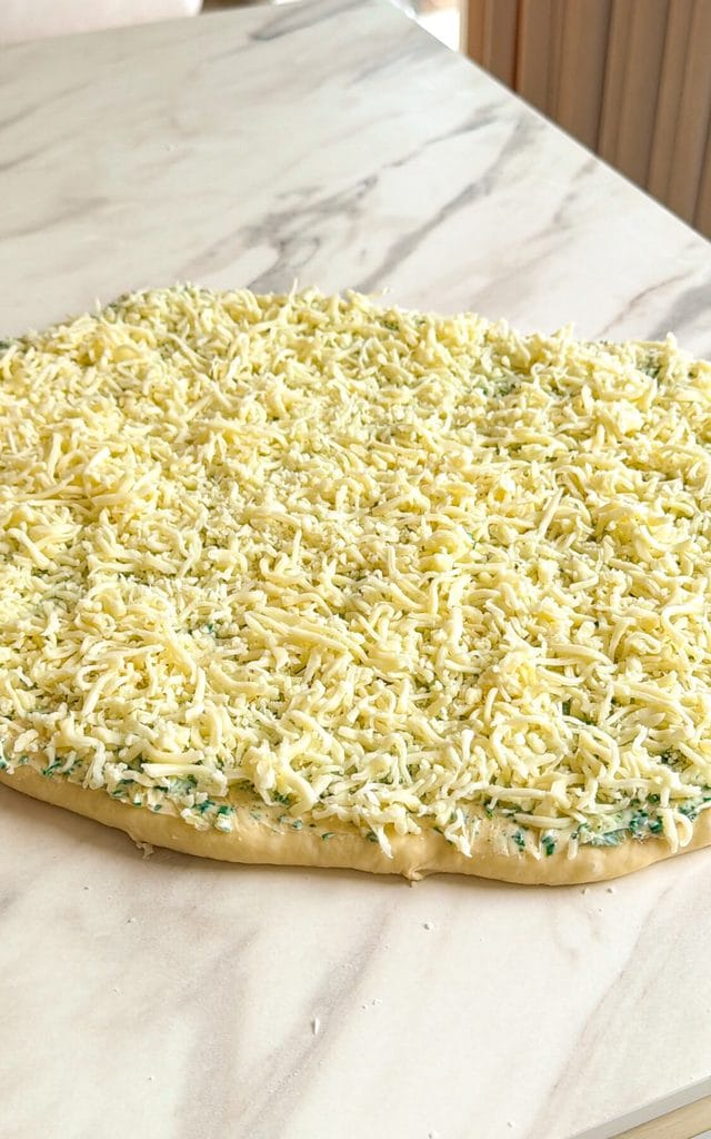 rolled dough for garlic rolls with mozzarella cheese