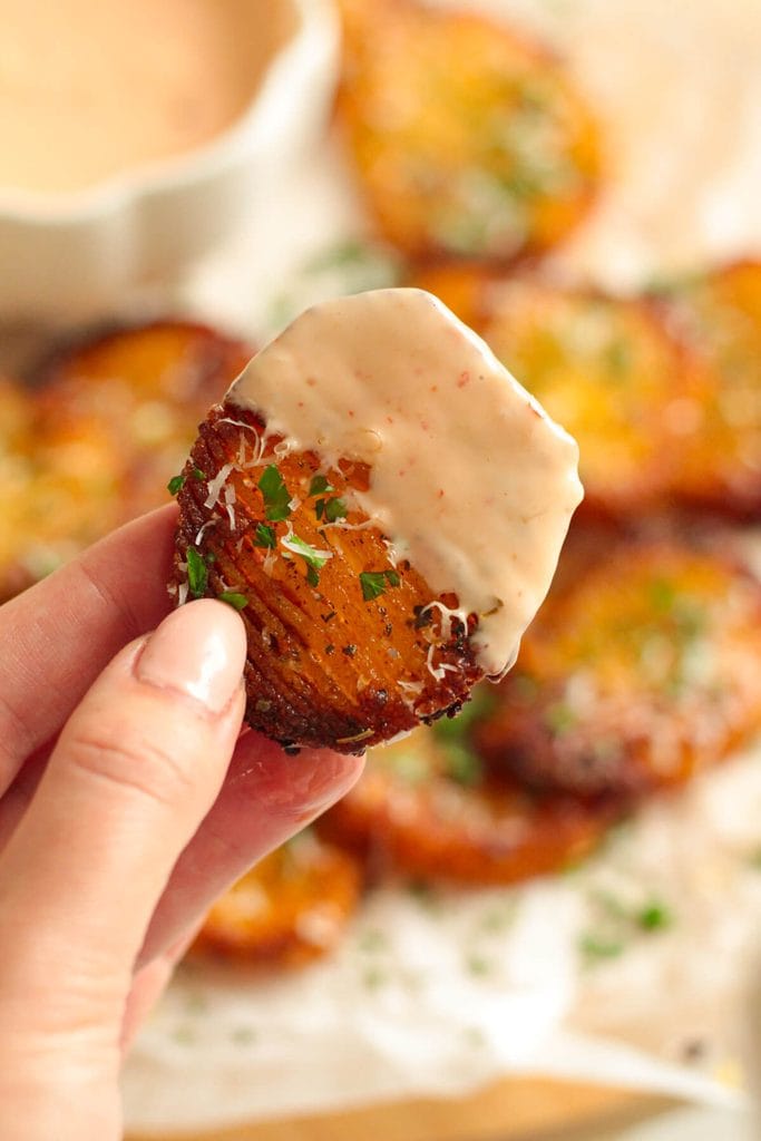 crispy garlic accordion potatoes with a dipping sauce